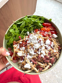 Pasta met kalkoenspek, shimeji en rucola